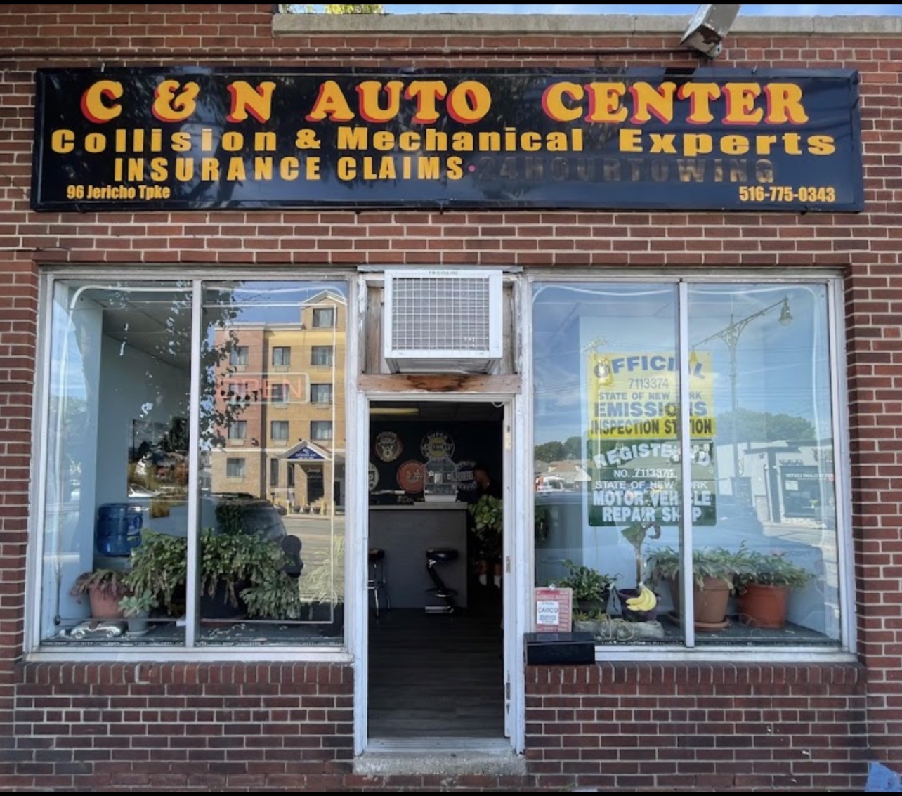 C&N Auto Center signage — Collision & Mechanical Experts